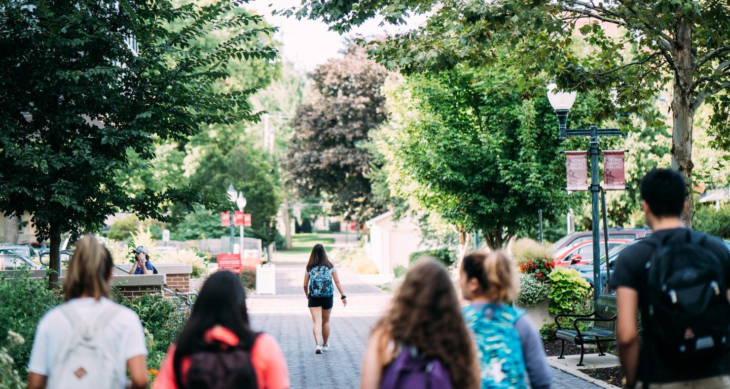 students walking on campus