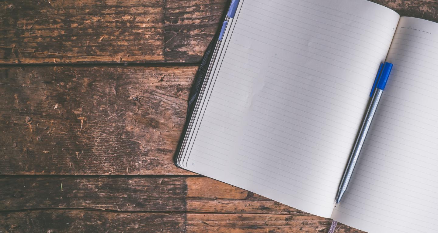 Notebook on wooden table