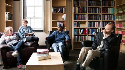 Shimer students and faculty sitting in lounge 