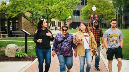 student and family on campus